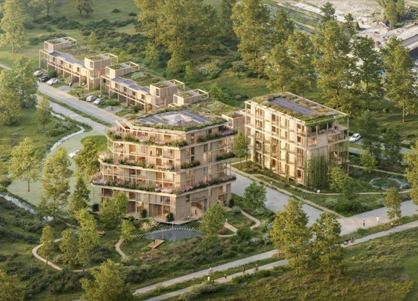 Wildgroei luchtrender van het woningcomplex met sedumdaken en zonnepanelen en natuur er omheen