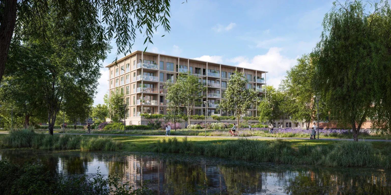 Woodstock render van het gebouw aan de vijver met wandelaars en fietsers in het park